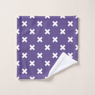 White cross stitches on ultra violet wash cloth