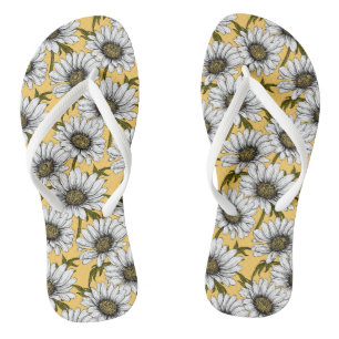 White daisies, wild flowers on yellow thongs