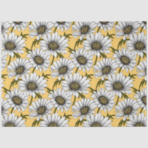 White daisies, wild flowers on yellow tissue paper