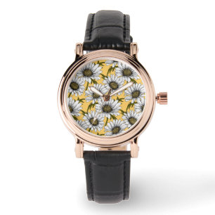 White daisies, wild flowers on yellow watch