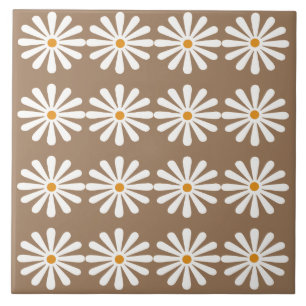 White daisies with yellow centres on sorrell brown ceramic tile