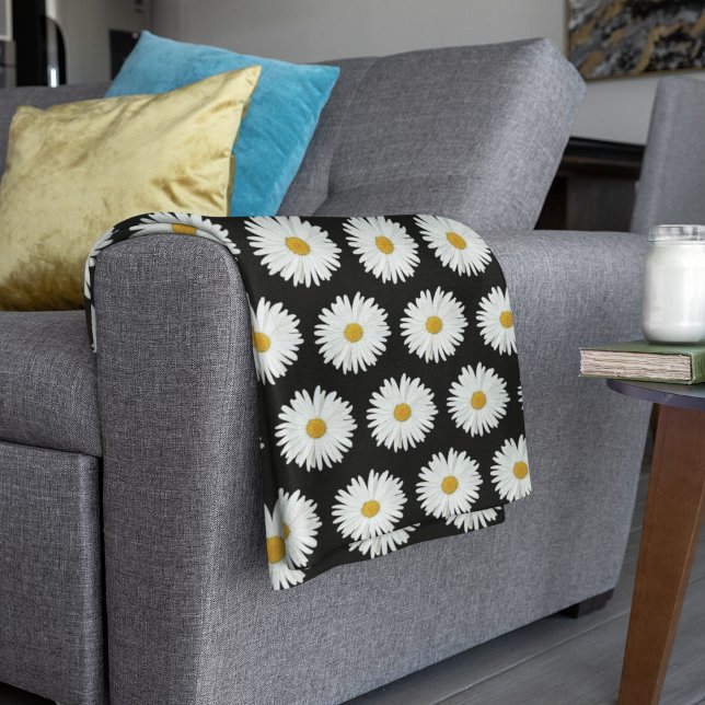 White Daisy Floral Pattern on Black Fleece Blanket (In Situ Folded)