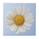 White Daisy Flower on Light Blue Background Ceramic Tile<br><div class="desc">A close-up photo of a beautiful white daisy flower with yellow centre on light blue background.</div>