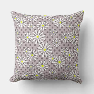 White daisy flowers on a beige brown polka dot cushion