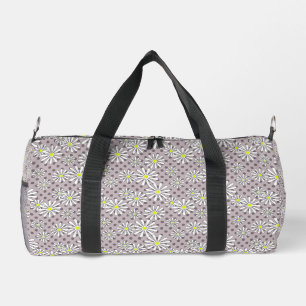 White daisy flowers on a beige brown polka dot duffle bag