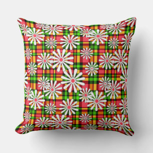 White daisy flowers on a red green checkered backg cushion