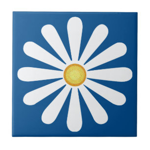White daisy, yellow centre, on lapis blue ceramic tile