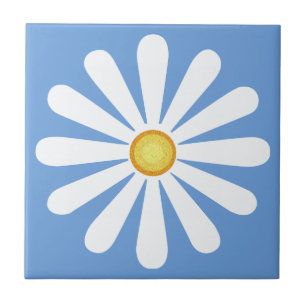 White daisy, yellow centre, on little boy blue tile