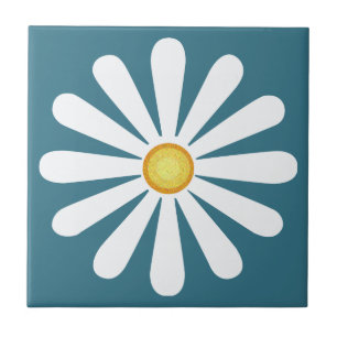 White daisy, yellow centre, on teal blue tile