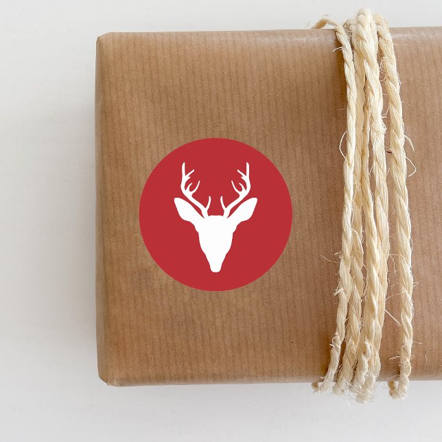 White Deer Head Silhouette On Red Classic Round Sticker (Ideal for the Holiday season.)