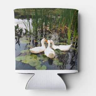 White ducks, lily pads, cattails, lake shore can cooler