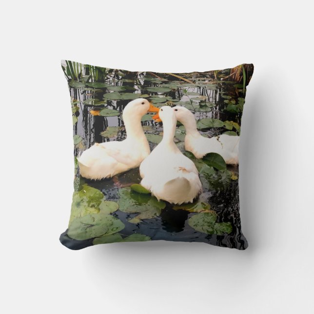 White ducks, lily pads, cattails, lake shore cushion (Front)