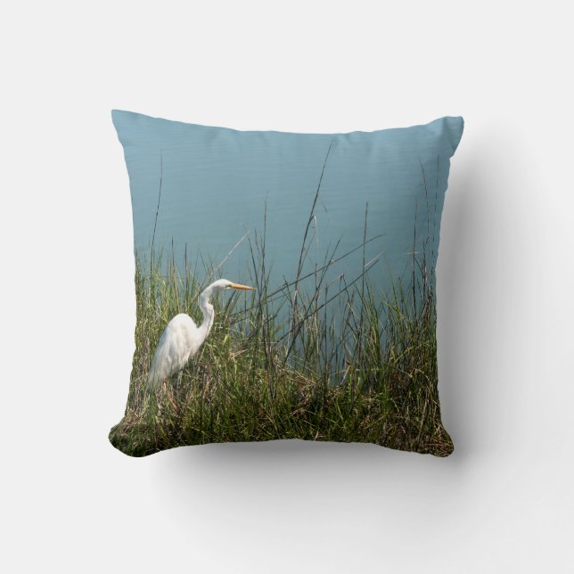 White egret standing in grass w water cushion (Front)