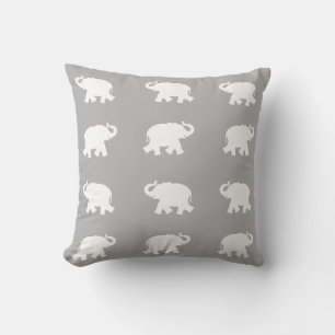 White elephant pattern on light grey cushion