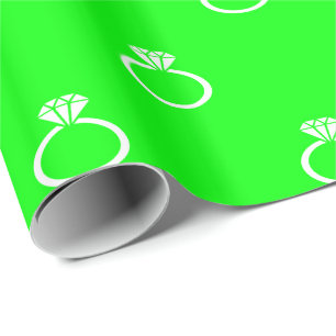 White Engagement Rings on Lime Green Wrapping Paper