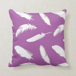 White feather print on amethyst purple cushion