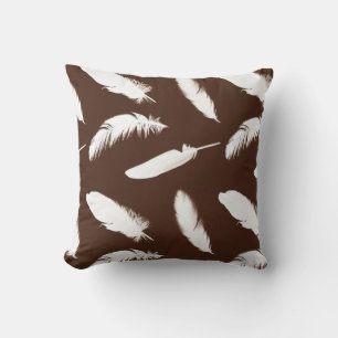 White feather print on chocolate brown cushion