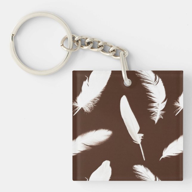 White feather print on chocolate brown key ring (Front)
