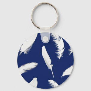 White feather print on dark blue key ring