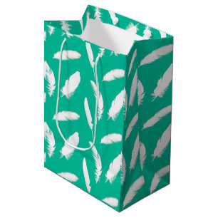 White feather print on turquoise medium gift bag