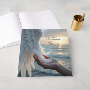 White feathers from an angel's wing, condolence guest book
