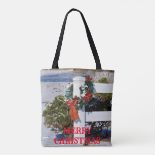 White Fence with Snow and a Red Bow Tote Bag