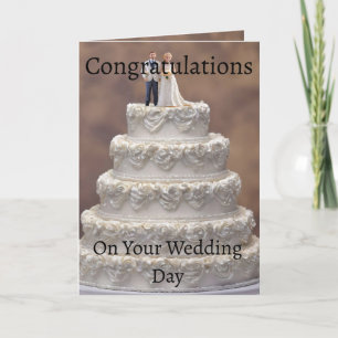 White Five Tier Wedding Cake With Bridal Couple, Card