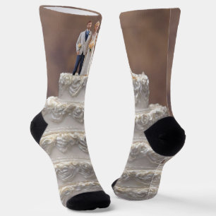 White Five Tier Wedding Cake With Bridal Couple, Socks