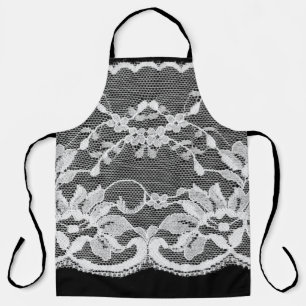White floral lace: black background. apron