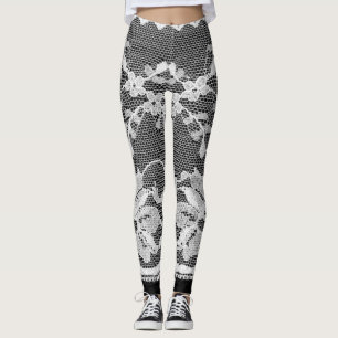 White floral lace: black background. leggings