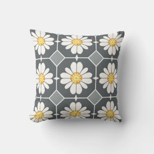 white floral pillow with yellow centre