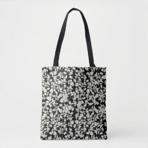 White flowers black background tote bag