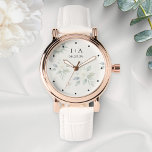 White Flowers Elegant Personalized Couple Names Watch<br><div class="desc">Carry a touch of romance wherever you go with this elegant, personalized watch. Featuring a delicate arrangement of white flowers and sage green leaves in a watercolor style, this botanical themed design perfectly captures a soft, modern romantic aesthetic. The elegant floral face is complemented with deep blue typography, allowing you...</div>