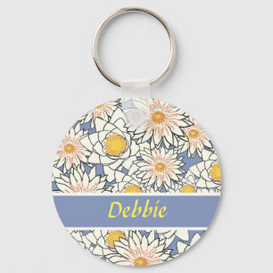 White flowers on blue key ring