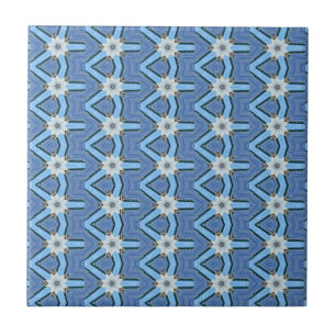 white flowers on blue tile