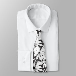 White flowers on dark gray tie