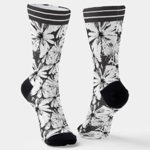 White flowers on dark grey socks