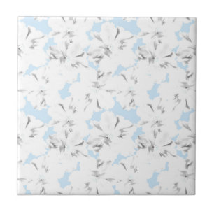 White flowers on light blue. ceramic tile