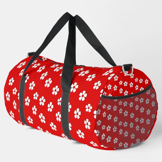 White flowers on red duffle bag (Right Corner)
