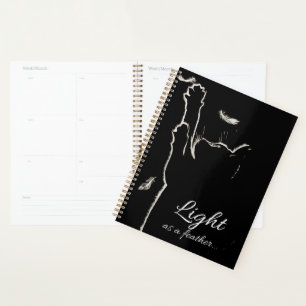 White fluff blacky cat planner