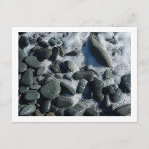 white foam and black pebbles postcard