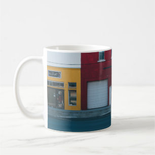 WHITE GARAGE DOORS CLOSED DURING DAYTIME COFFEE MUG