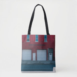 WHITE GARAGE DOORS CLOSED DURING DAYTIME TOTE BAG