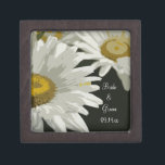 White Garden Daisies Wedding Gift Box<br><div class="desc">Customise the pretty White Garden Daisies Wedding Gift Box with the personal names of the bride and groom and specific marriage ceremony date. This elegant little box is also perfect for the ring bearer to carry the wedding rings in down the aisle at the wedding ceremony. This beautiful botanical wedding...</div>