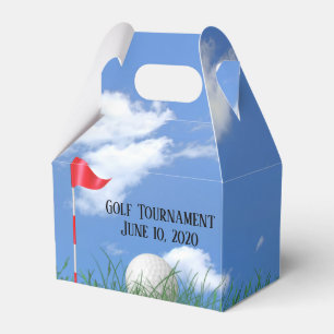 white golf ball and flag in grass favour box