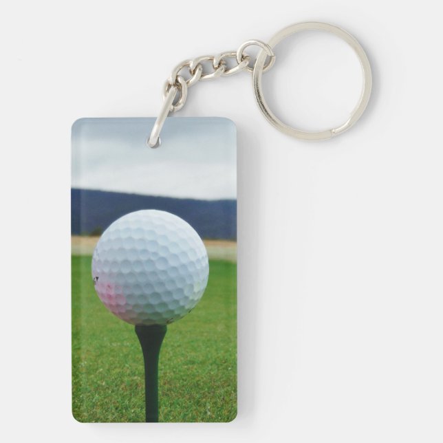 white Golf Ball on a mountain golf course Key Ring (Back)
