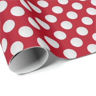 White Golf Balls on Dark Red Wrapping Paper