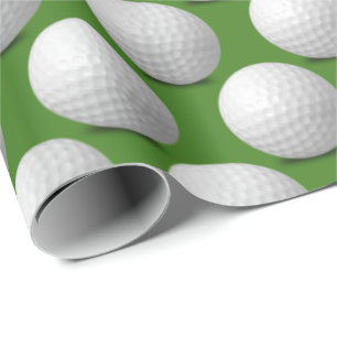 white golf balls on green wrapping paper