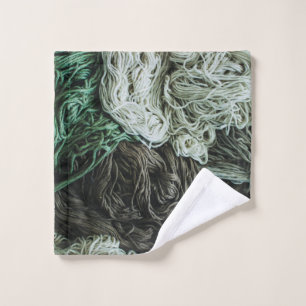 White, grey, and green ropes wash cloth