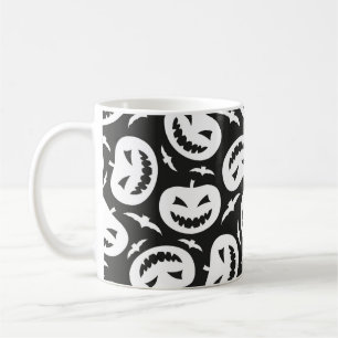 White halloween pumpkins and bats isolated on blac coffee mug